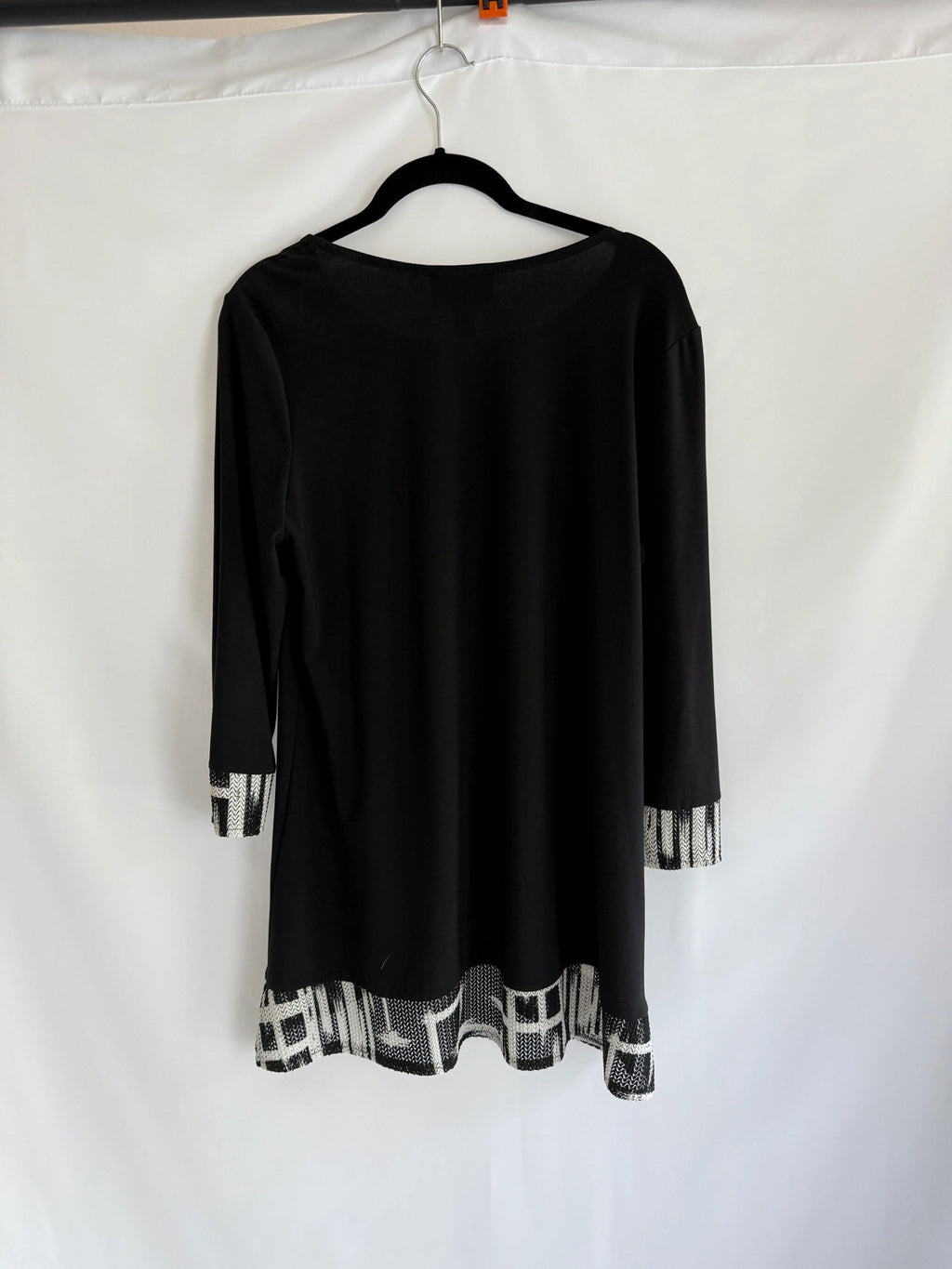 Joseph Ribkoff Black Tunic with geometric trim. Size 12.