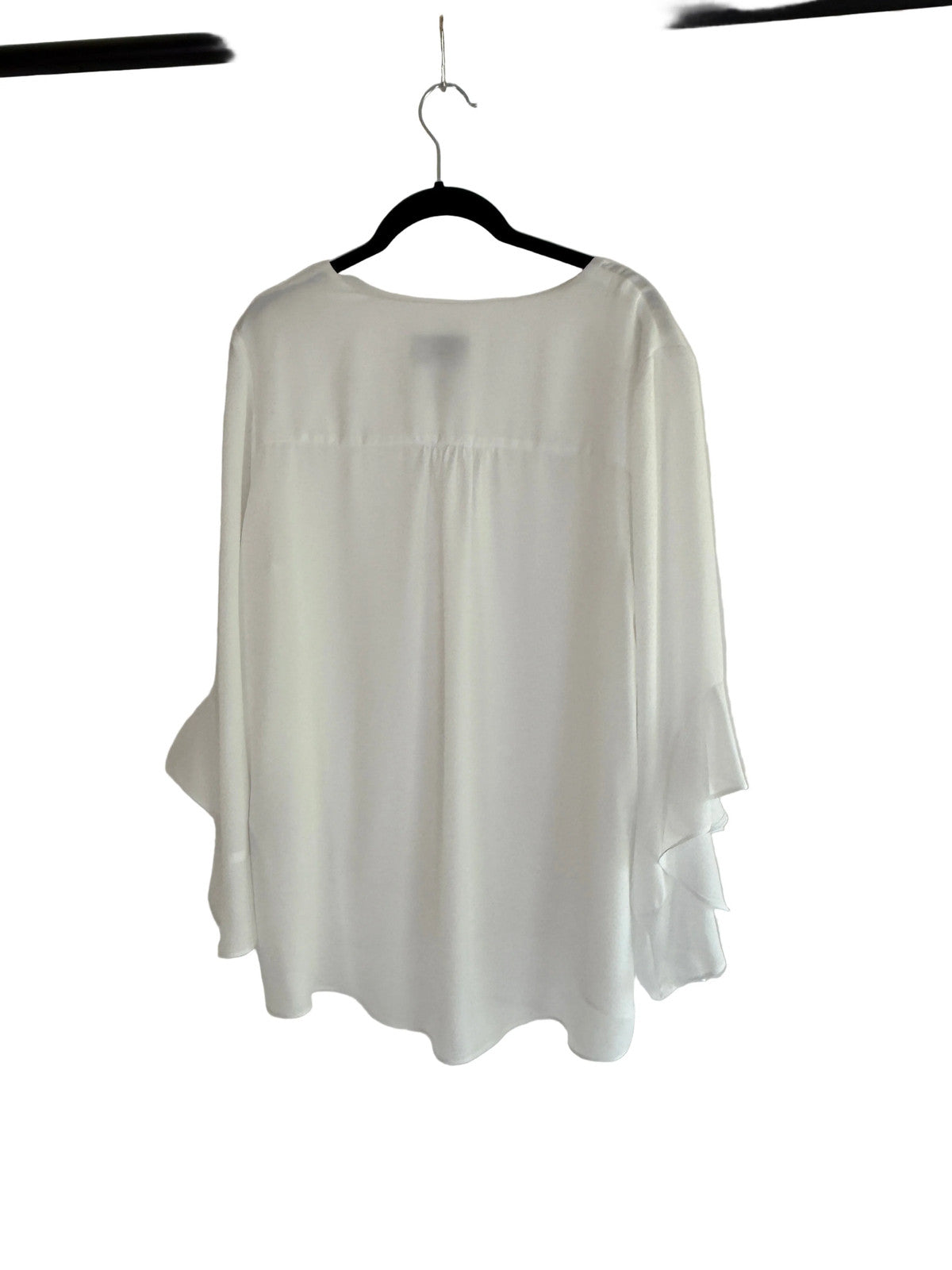 Joseph Ribkoff white chiffon with ruffled sleeves and asymetric hem tunic.